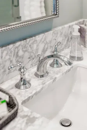 Modern faucet on the sink for convenience and style.