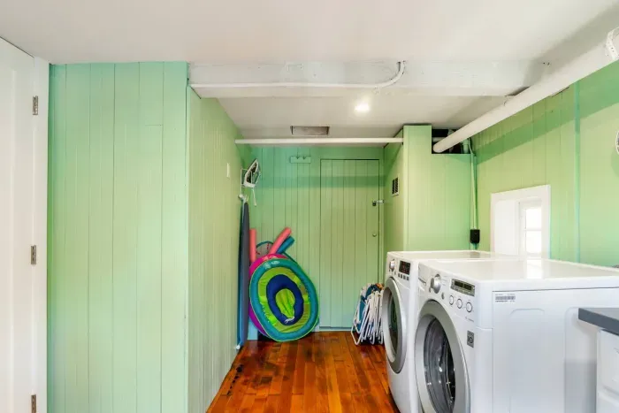Fully equipped laundry room with modern appliances.