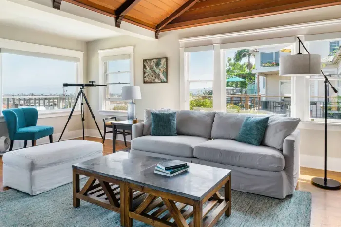 Living room featuring a telescope for stargazing and relaxation