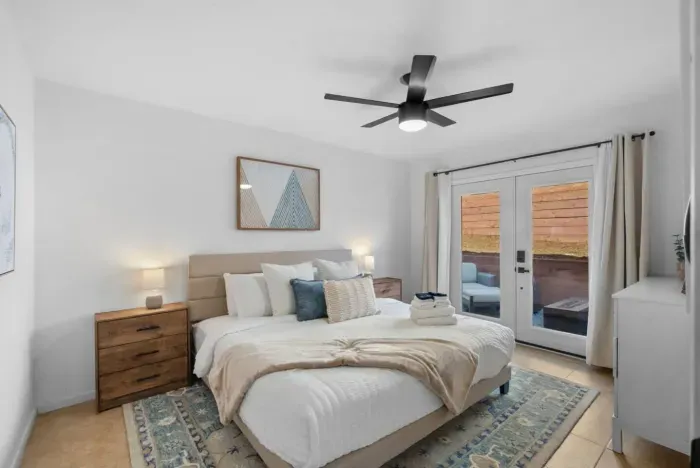 Bright bedroom with backyard access