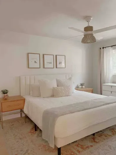 Inviting and cozy bedroom with comfortable bedding for a restful night's sleep.