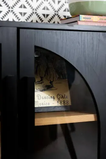 Unique vintage artwork adds authentic charm and character to the space.