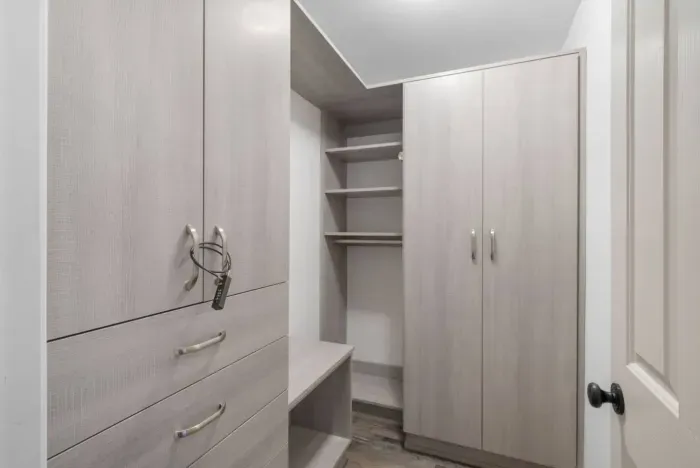 Bedroom 3 has a spacious modern walk-in closet