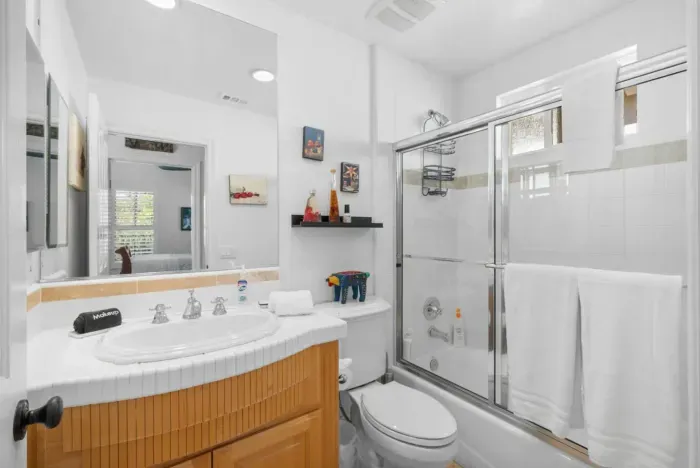 Cozy bathroom with tub on the third floor across from Bedroom 2