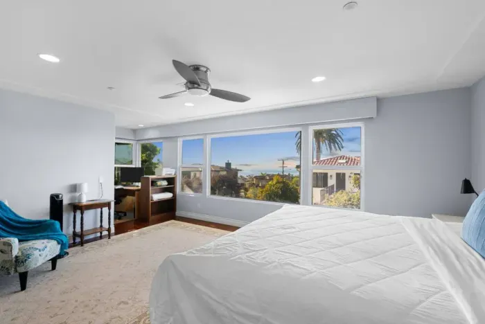 Bedroom 1 is a bright room with ocean view