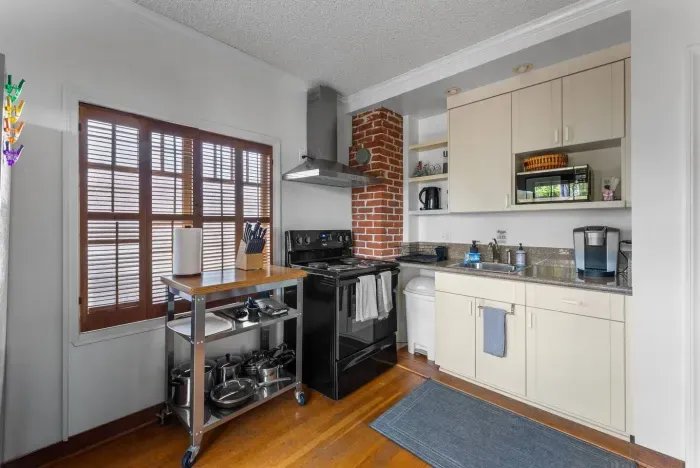 Bright, airy, and rich with history—your Hillcrest home awaits.
