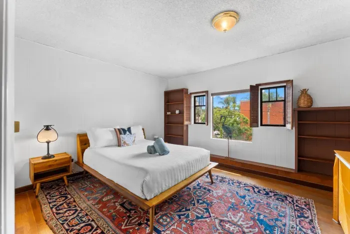 Thoughtful furnishings complement vintage details throughout the suite.