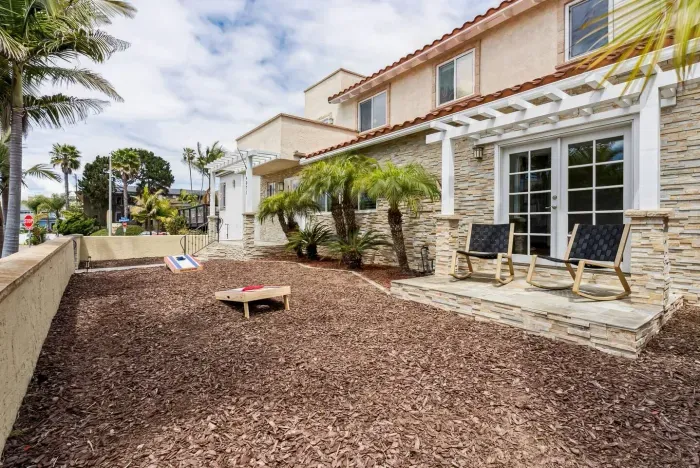 Outdoor living area with direct yard access.