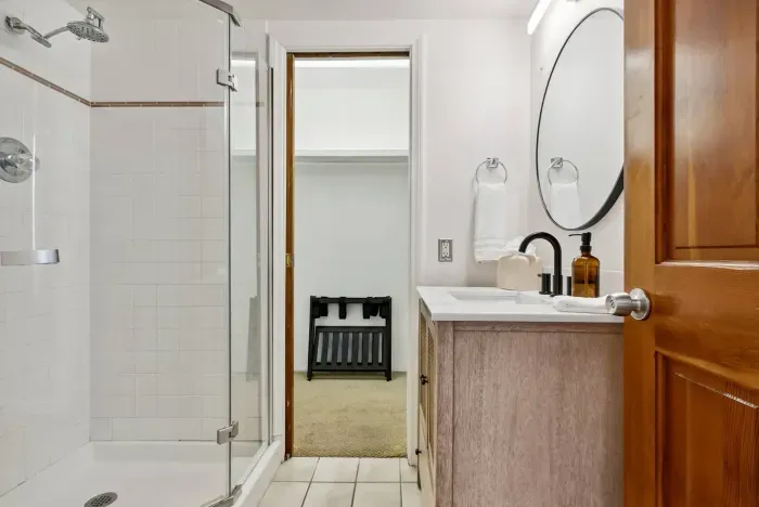 Freshly styled bathroom with walk-in shower.
