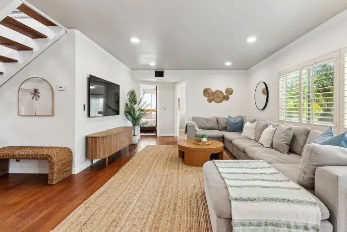 Relaxed living area with stylish sectional sofa.