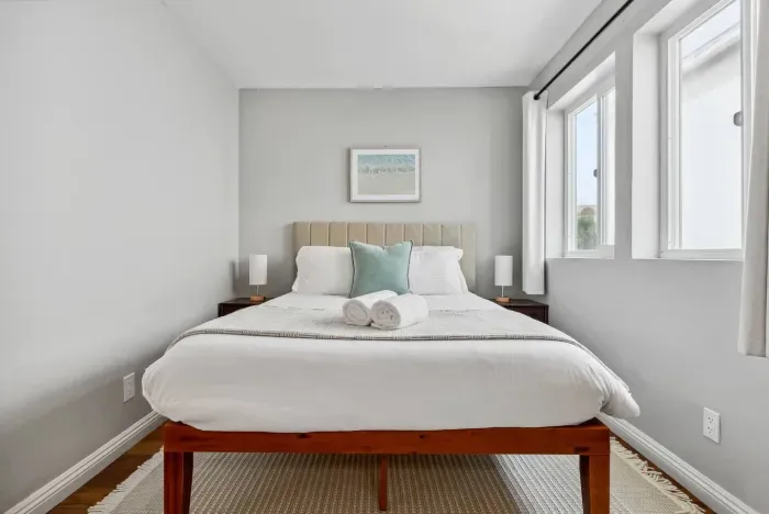 Serene bedroom with minimalist furnishings.