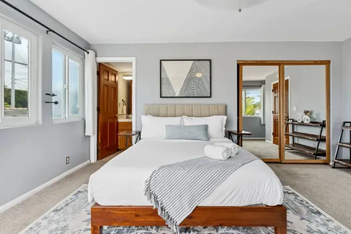 Cozy bedroom with wood accents and simple design.