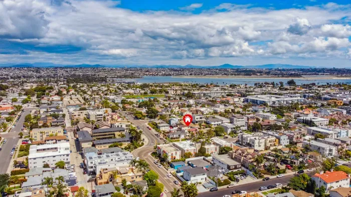 Bay-close retreat in walkable coastal district with scenic views