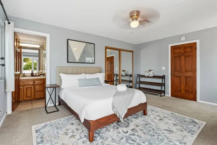 Stylish bedroom with twin nightstands and modern touches.