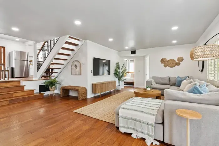 Contemporary living space with large sectional seating.