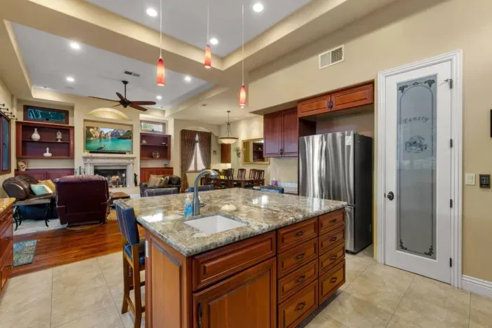 Modern kitchen with all essential appliances.