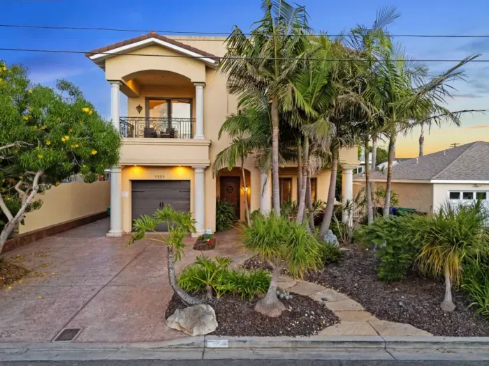 Spacious three-story house with modern amenities.