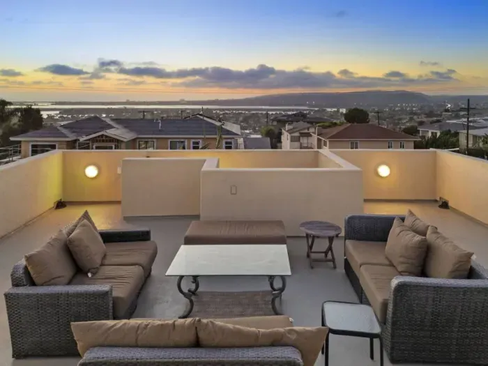 Roof deck with enchanting lights at night.