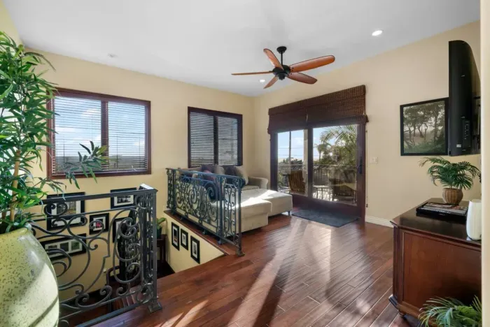 Second-floor living room with scenic views.