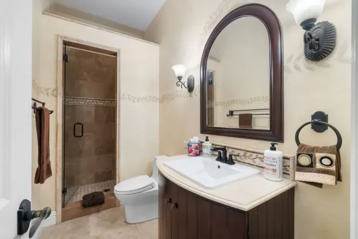 Bathroom with a convenient shower.