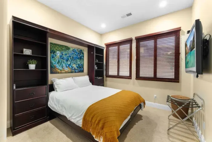 First-floor bedroom with a queen bed.
