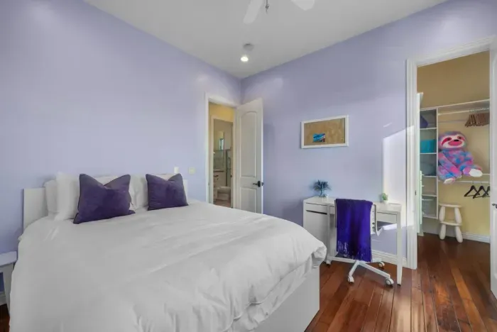 Bedroom 2 features a cozy queen bed.