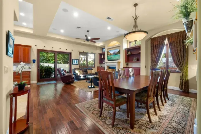 Dining area adjacent to living room and kitchen.