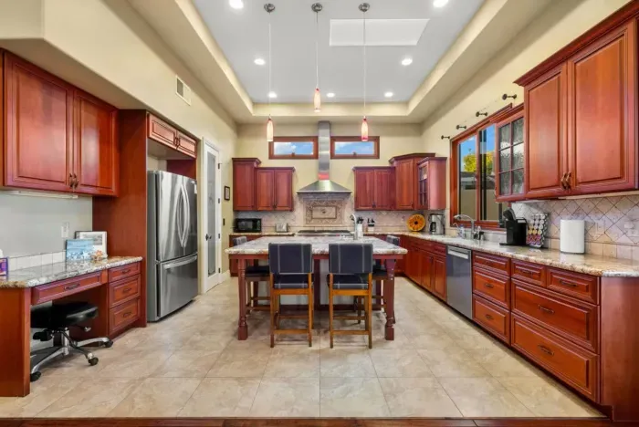 Spacious kitchen with ample counter and storage.