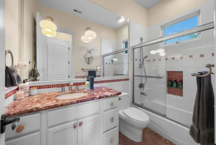 Stylish bathroom with contemporary fixtures and amenities.