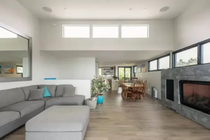 Enjoy seamless entertaining and gatherings with a spacious living room seamlessly connected to a dining area, perfect for hosting memorable moments with family and friends