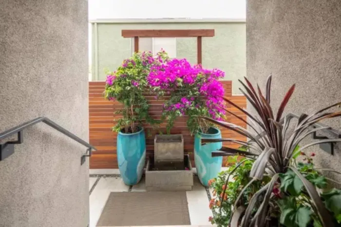 Enter into a world of vibrant beauty as colorful flowers greet you at the main entrance, setting the stage for a delightful and enchanting stay