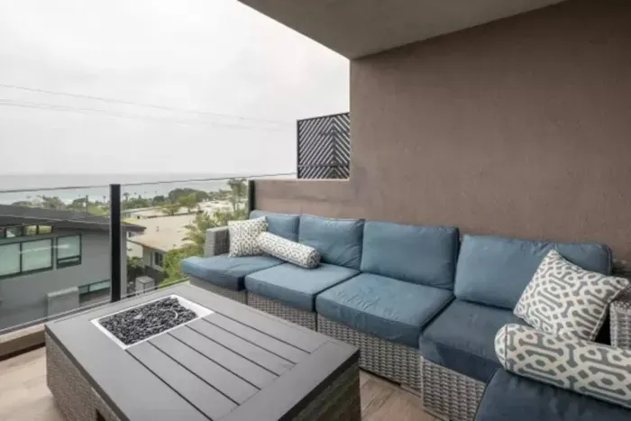 Savor the tranquil beauty of the beach from the comfort of your deck, where each moment offers a captivating glimpse into seaside serenity.