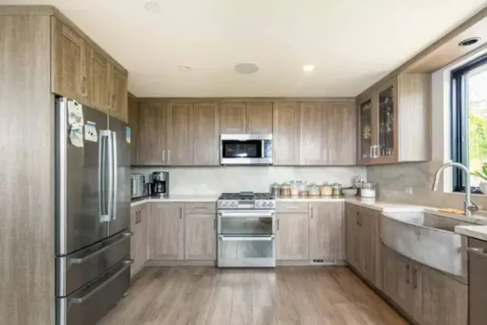 Savor the joy of culinary adventures in our fully equipped kitchen boasting top-of-the-line appliances, inviting you to create delicious meals and unforgettable memories during your stay