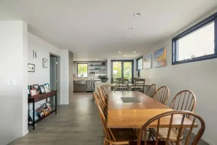 Gather around the stylish dining table for a memorable feast with your loved ones.