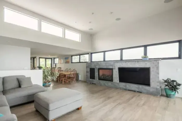 Cozy up to the warmth of a crackling fireplace in our inviting accommodations, where comfort meets charm