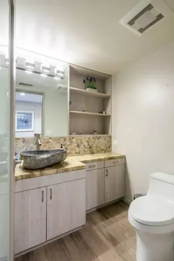 Experience the epitome of style and comfort in our impeccably designed bathroom, where every detail is crafted to elevate your stay to new levels of luxury.