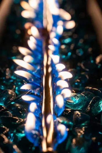 Fire shimmer reflecting candlelight