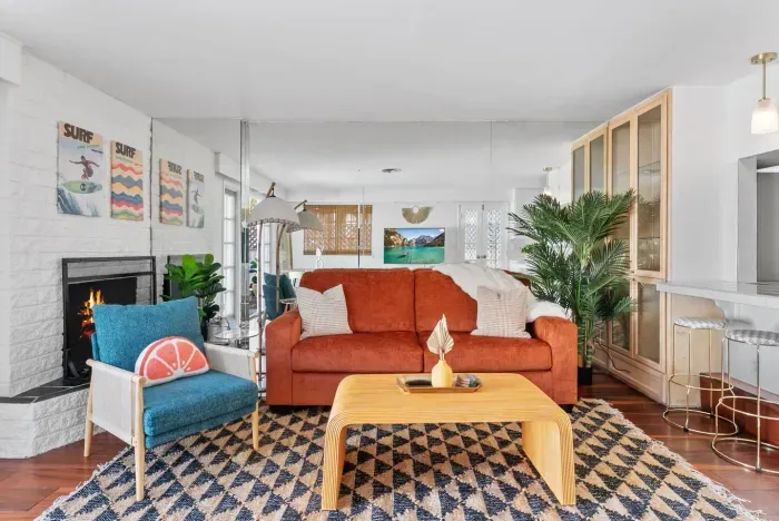 Retro-chic living room with citrus tones and coastal art