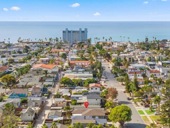Palm-lined streets leading toward the sea