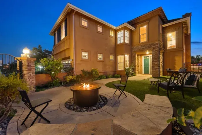 Firepit circle under twilight sky, perfect for evening talks
