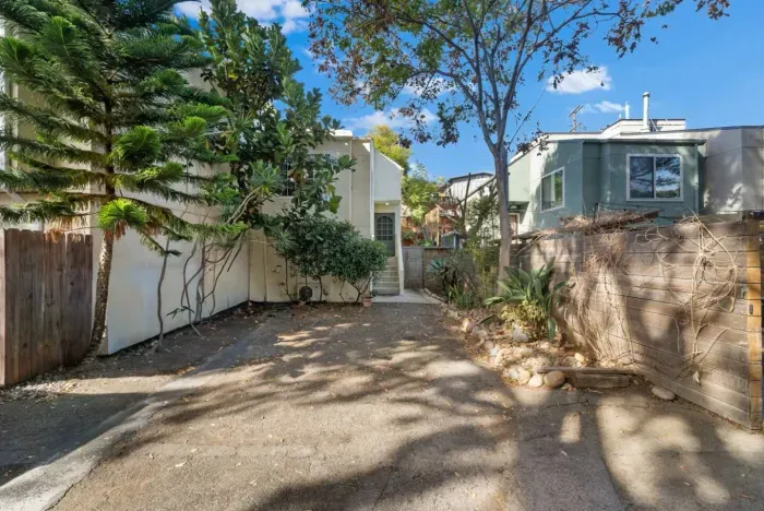 The front entrance. Please note the home is attached to the home on the left side of this photo. They only share one wall and no other spaces are shared