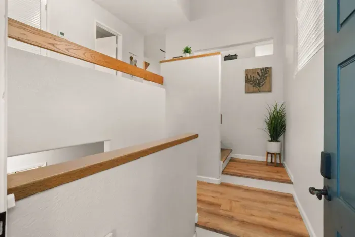 Welcome in! The home is split level and you enter on the middle level. Upstairs is the kitchen, living room, laundry and half bath