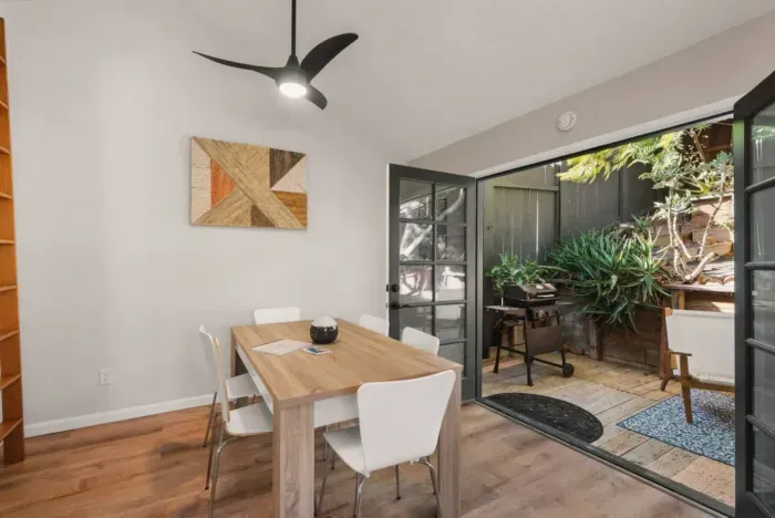 Dining area seats up to 6 and opens to the patio