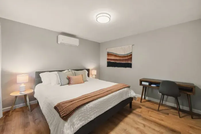 Bedroom 2 has a desk for working or writing