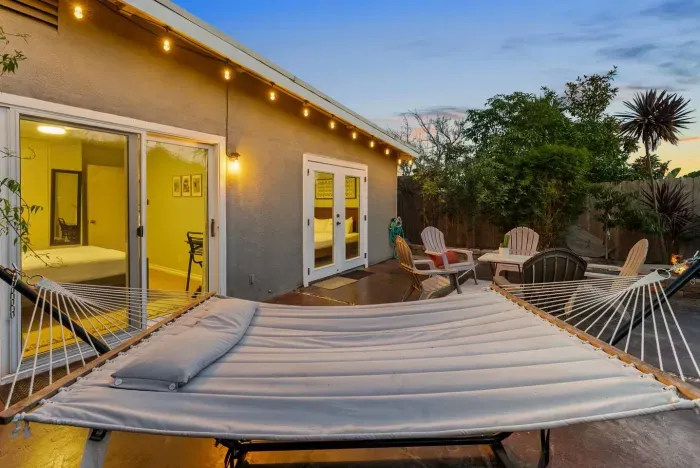 Unwind in style —sway in the hammock or gather by the fire pit under twinkling string lights.