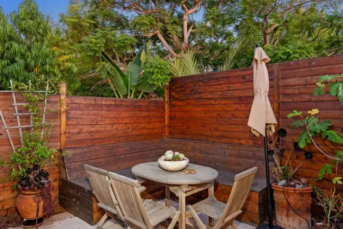 Cozy evening patio retreat ✨—perfect for dining al fresco or unwinding beneath the trees.