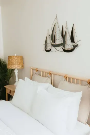 Bright bedroom and serene sailboat décor.
