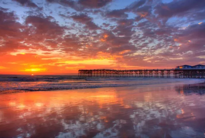 Unforgettable Mission Beach sunsets paint the sky in vibrant colors each evening.