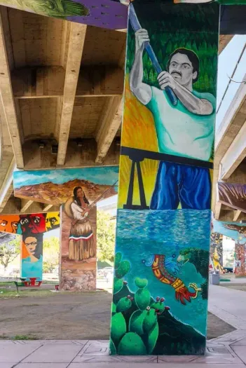 Immerse yourself in the powerful murals of Chicano Park, just one block from the home!