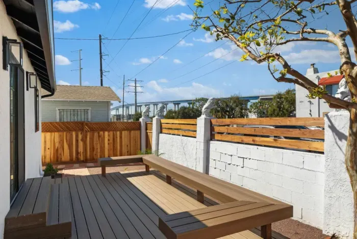 Inviting outdoor space with custom seating for sunny day relaxation!